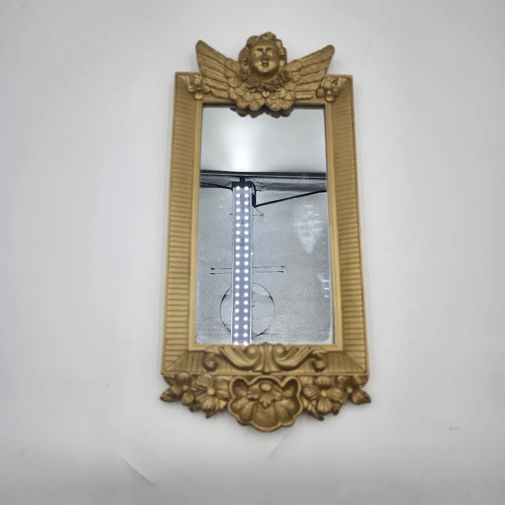 Vintage gold 80s Hollywood Regency Cherub Angel Figural Wall Mirror guilded